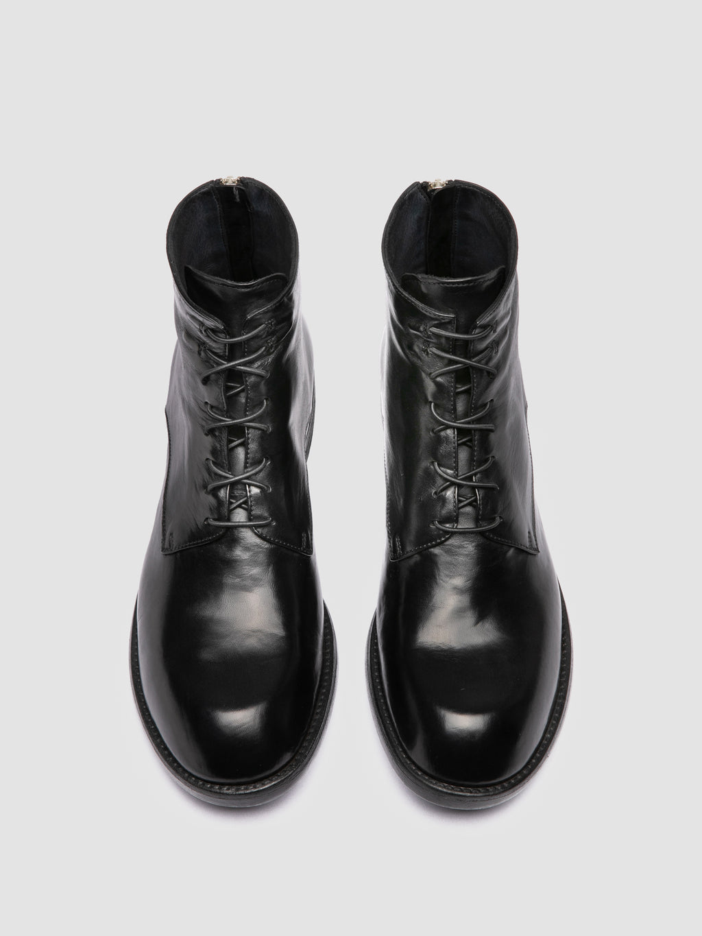 DIARY 010 - Black Leather Zipped Boots