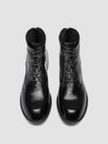 DIARY 010 - Black Leather Zipped Boots