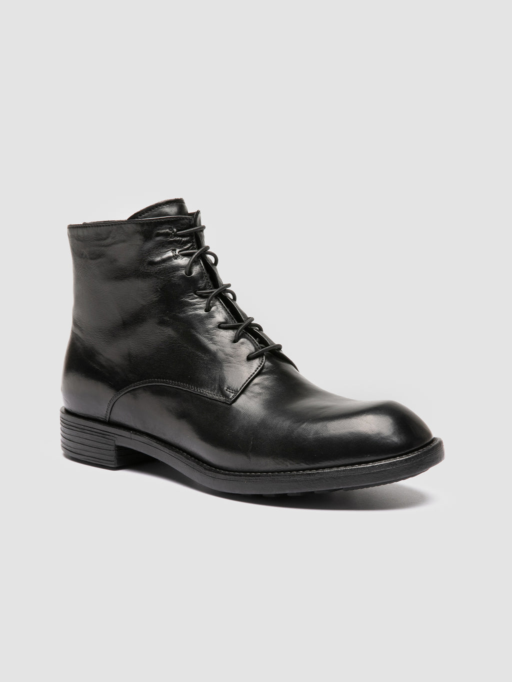 DIARY 010 - Black Leather Zipped Boots