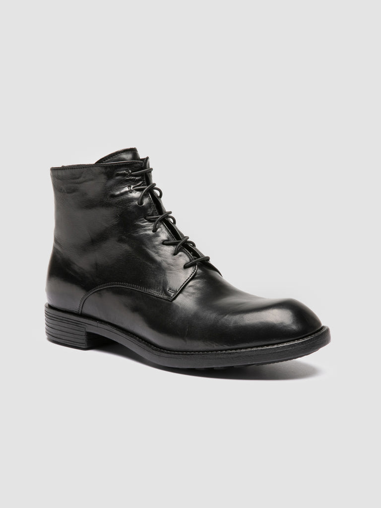 DIARY 010 - Black Leather Zipped Boots