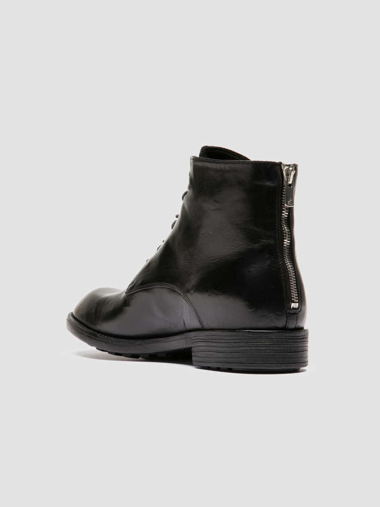 DIARY 010 - Black Leather Zipped Boots