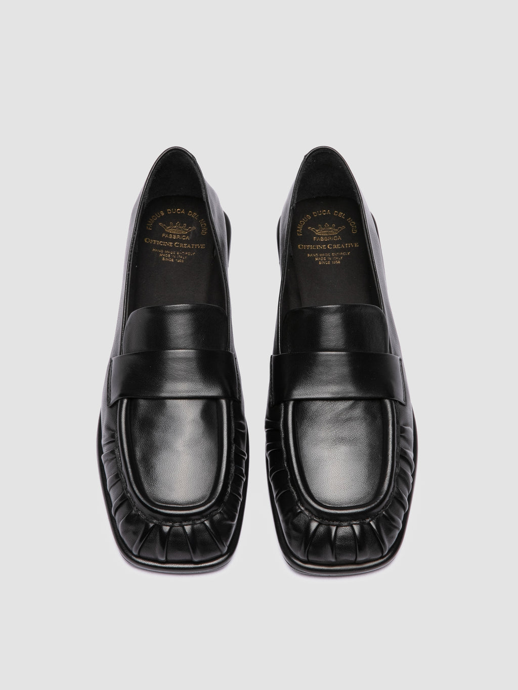 CLOVER 005_W - Schwarze Pennyloafer aus Leder - image 2,side view