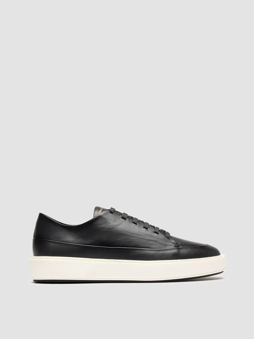 RELEASE 001 - Graue Low-Top-Sneaker aus Leder - image 1,side view